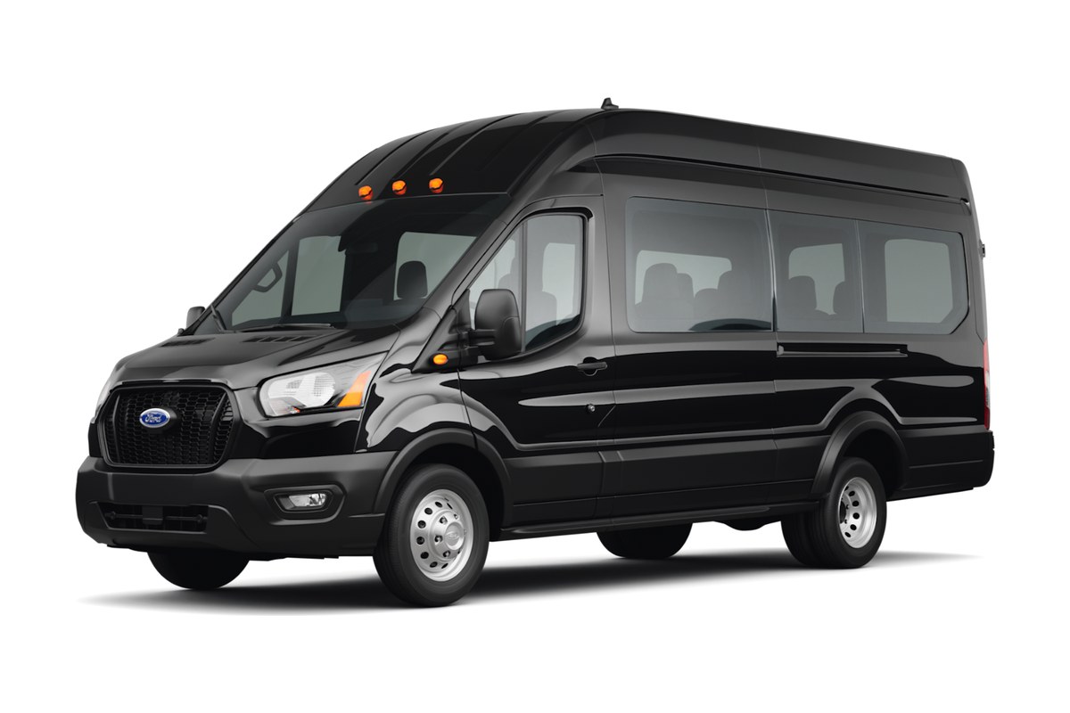 Black 14 passenger Luxplora van for transfers from SJU to Condado